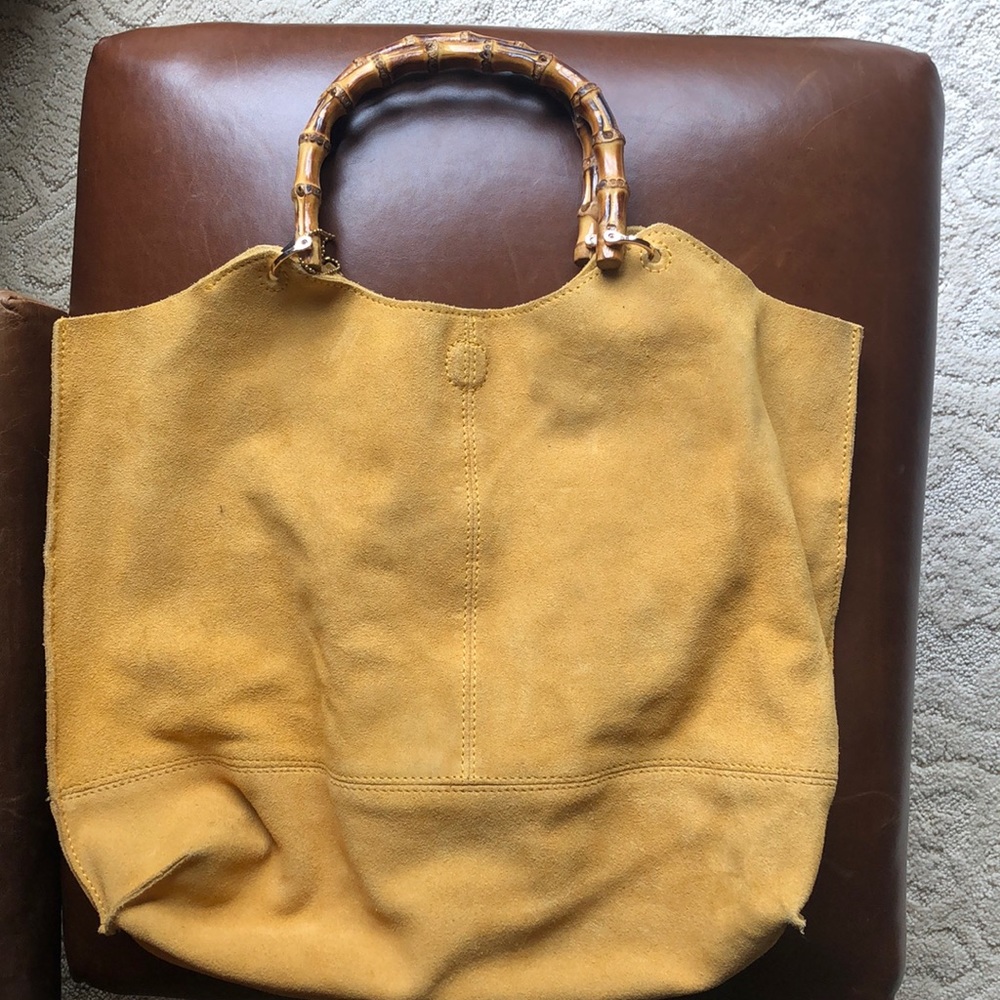 Yellow suede handbag with bamboo handles